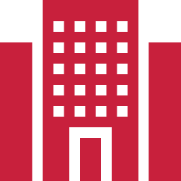 Icon of a building with a rectangular structure and multiple small square windows, colored in red with a green background.