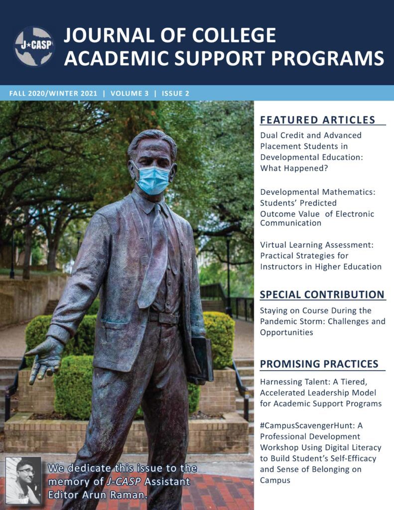 A statue of a man wearing a blue mask.