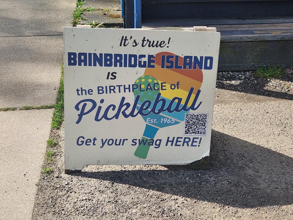 Sign advertising Bainbridge Island as Pickleball birthplace.